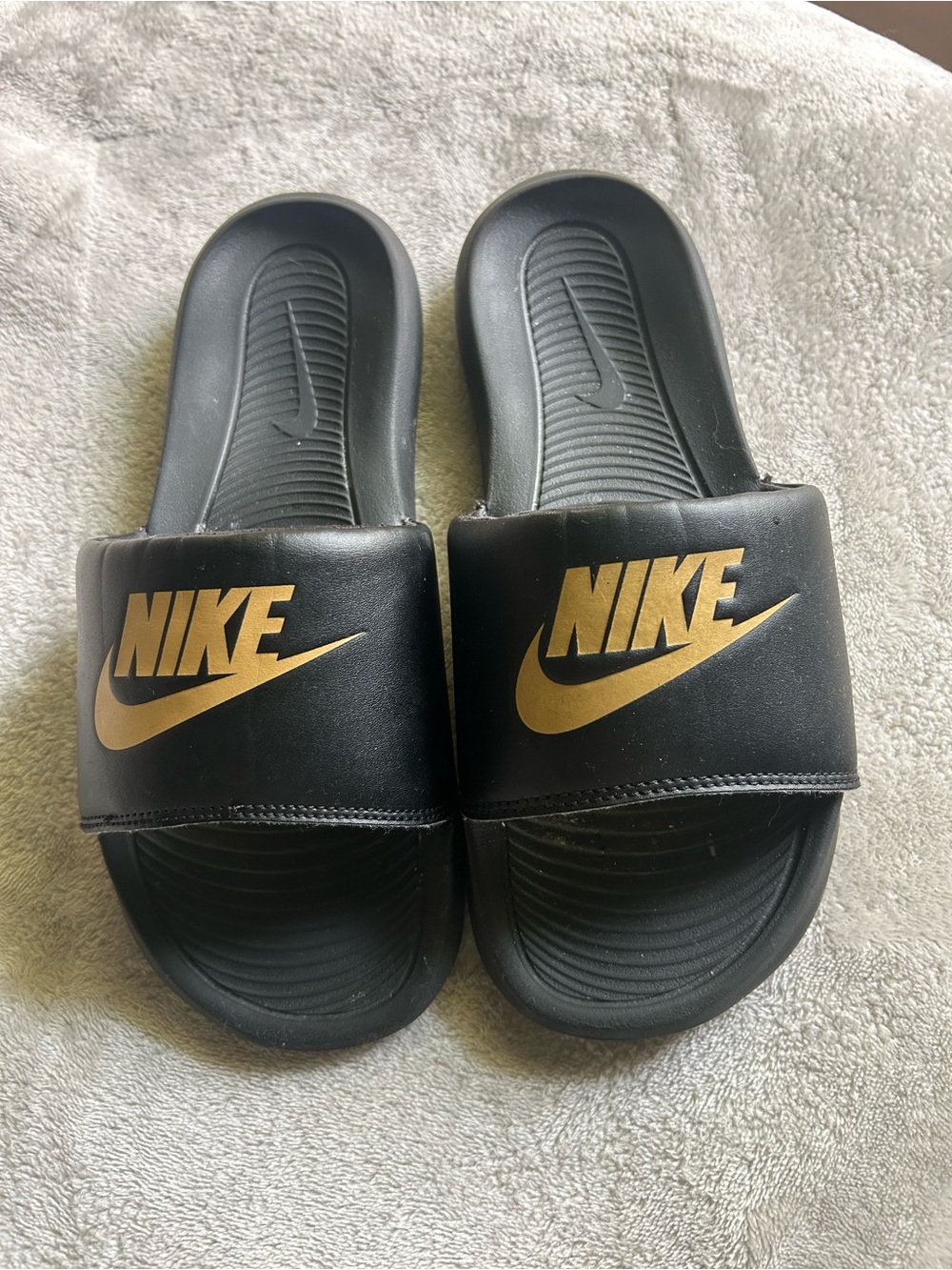Nike mens Black Slides with Gold Swoosh